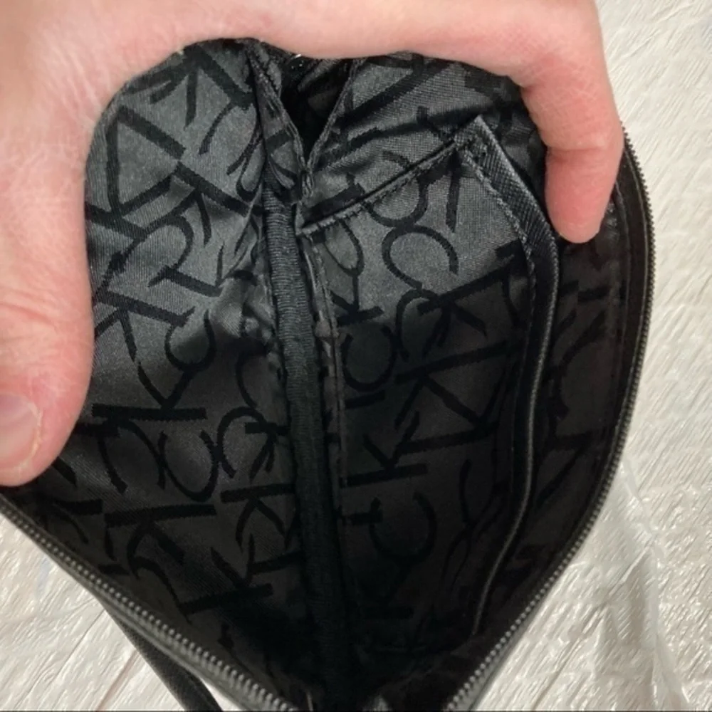 Calvin Klein gray black signature ck wristlet bag